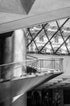 Modern architectural interior with a staircase and glass ceiling